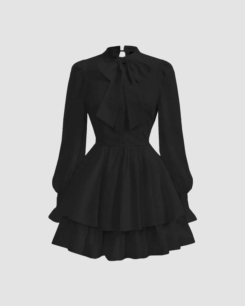 Black high-neck dress featuring voluminous puff sleeves for a sophisticated, statement look.