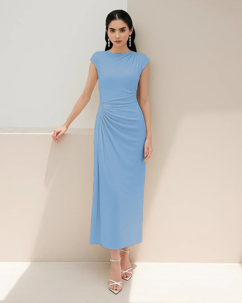 Powder blue high neck maxi dress made from soft jersey fabric, featuring a twist ruched design and a split detail.
