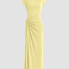 Women's yellow maxi dress with a ruched high neck and split design, styled in a solid twist design.