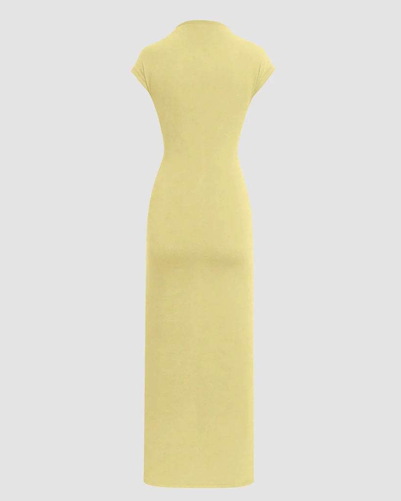 Back view of a Women's yellow maxi dress with a ruched high neck and split design, styled in a solid twist design.