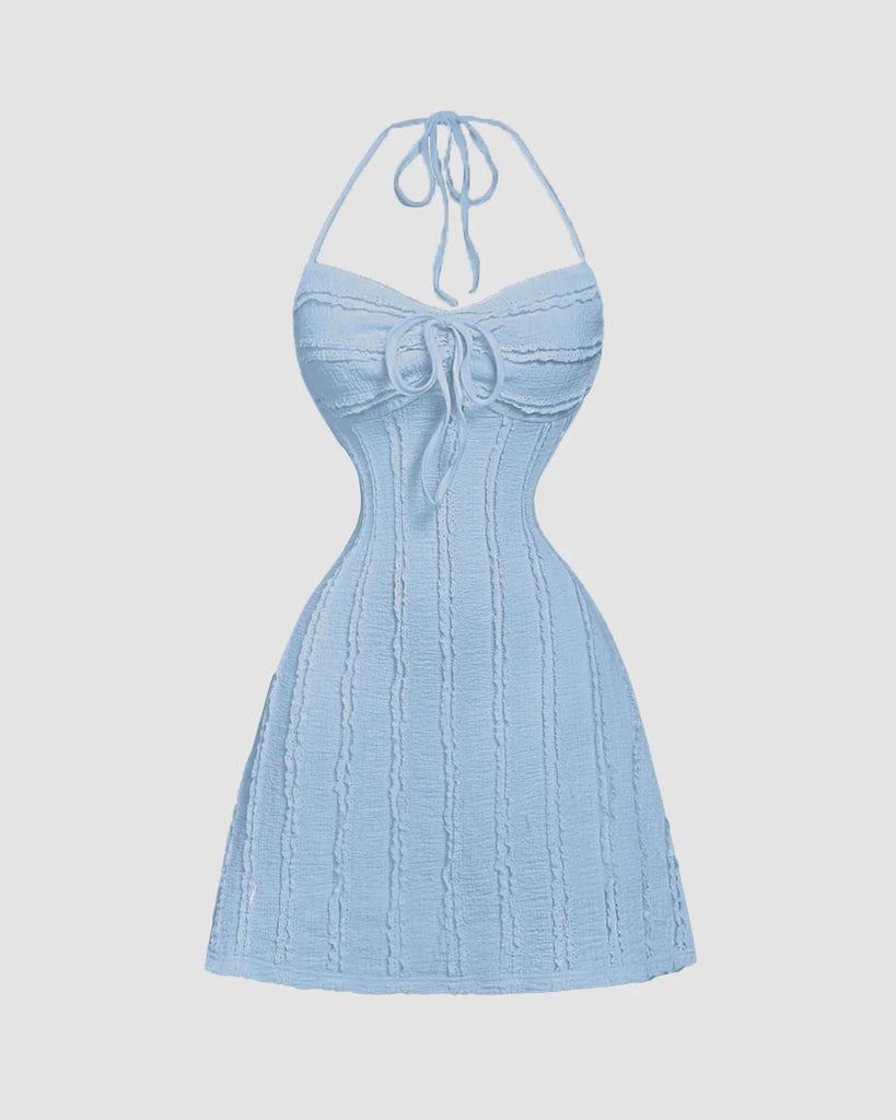 Dusty blue knitted halter neck mini dress with back tie, front tie detail, and open back for a flattering fit.