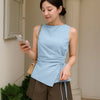 Woman wearing Light Blue Asymmetrical Ruched Side Tie Sleeveless Top