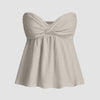 Light grey twist front top with empire bustier top with a flared silhouette and sweetheart neckline in soft textured fabric