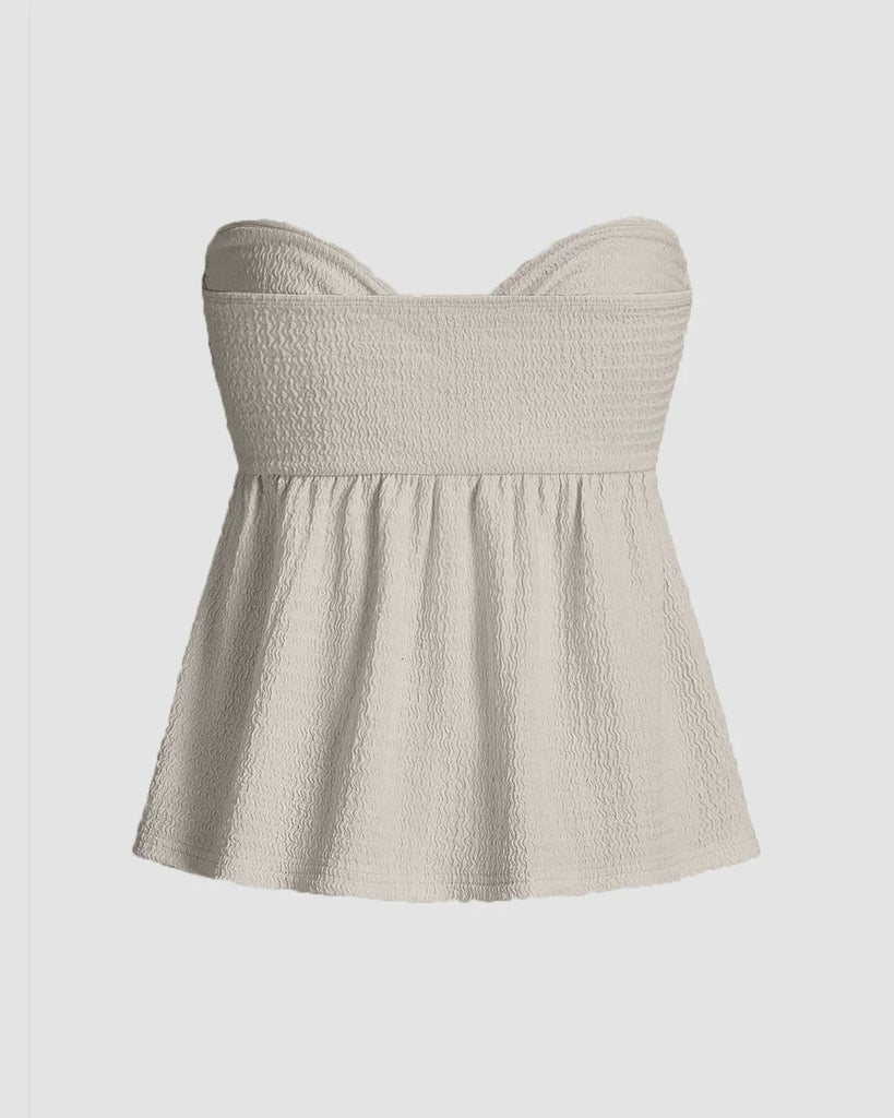 Light grey twist front top with empire bustier top with a flared silhouette and sweetheart neckline in soft textured fabric