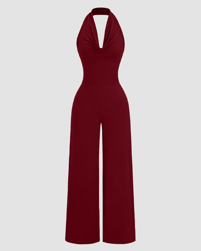 Maroon halter cowl neck jumpsuit with wide legs, made from stretchy fabric for a comfortable fit.