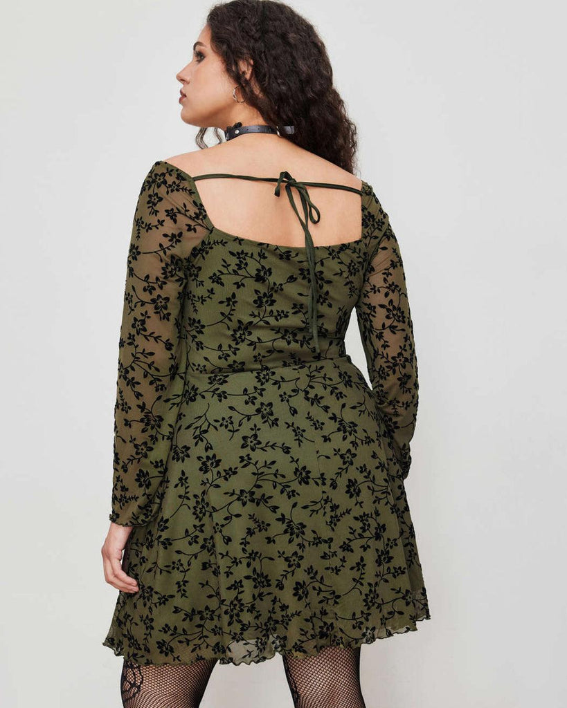 Back view of a Plus size floral lace mini dress featuring a mesh sweetheart neckline and knotted detail, perfect for stylish curves.