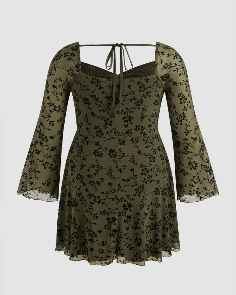 Plus size floral lace mini dress featuring a mesh sweetheart neckline and knotted detail, perfect for stylish curves.