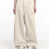 a grey crop top and mid-rise cargo wide-leg trousers