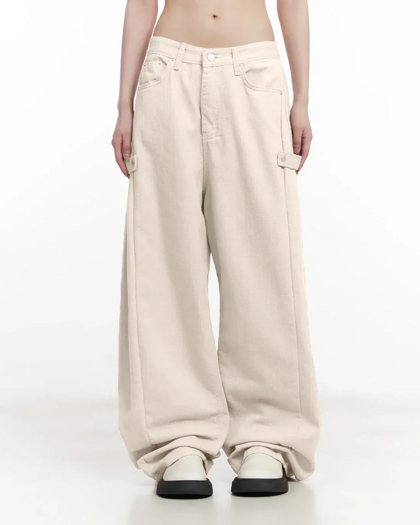 a grey crop top and mid-rise cargo wide-leg trousers