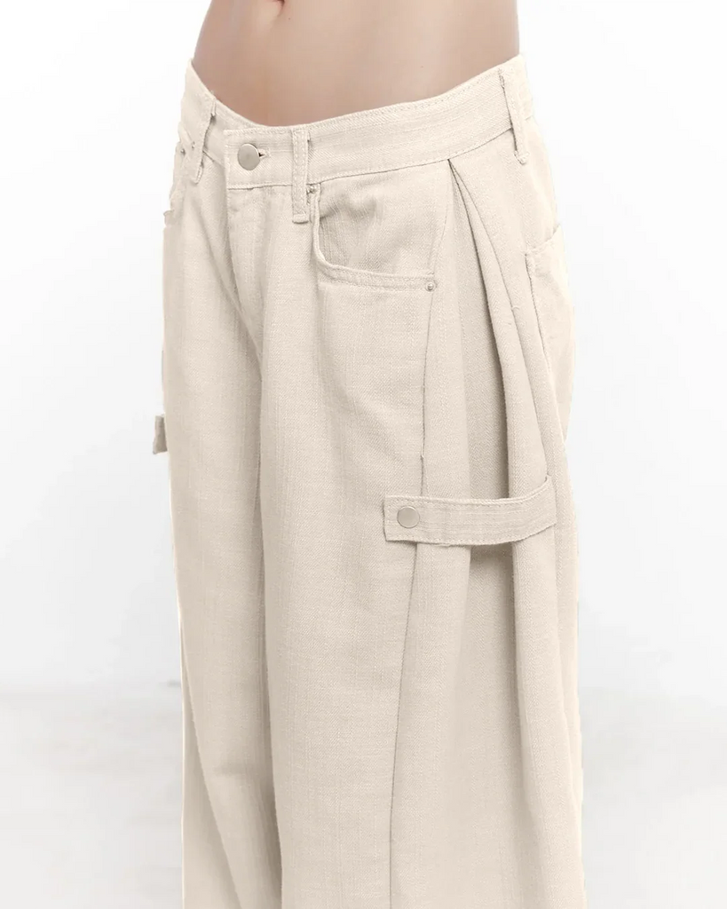 a grey crop top and mid-rise cargo wide-leg trousers