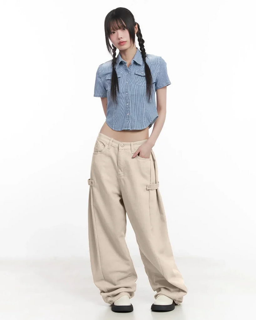 a grey crop top and mid-rise cargo wide-leg trousers