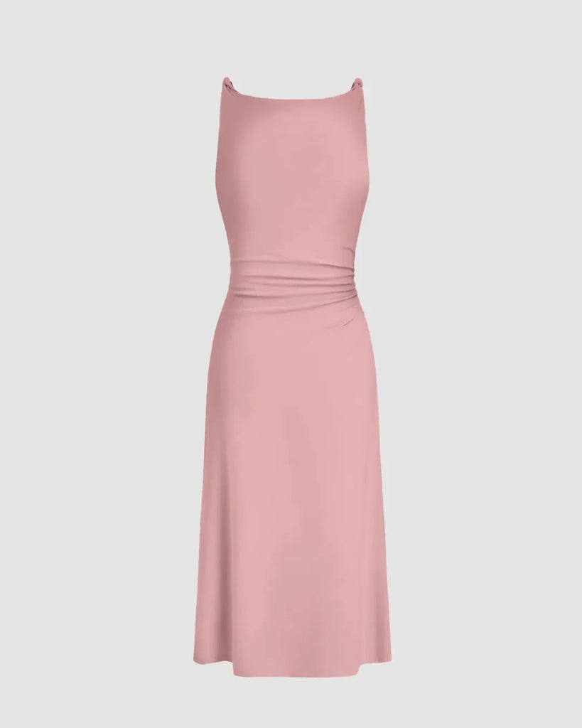 Back view of a minimal cowl neck bodycon dress in dusty pink with a scoop neck and straps.