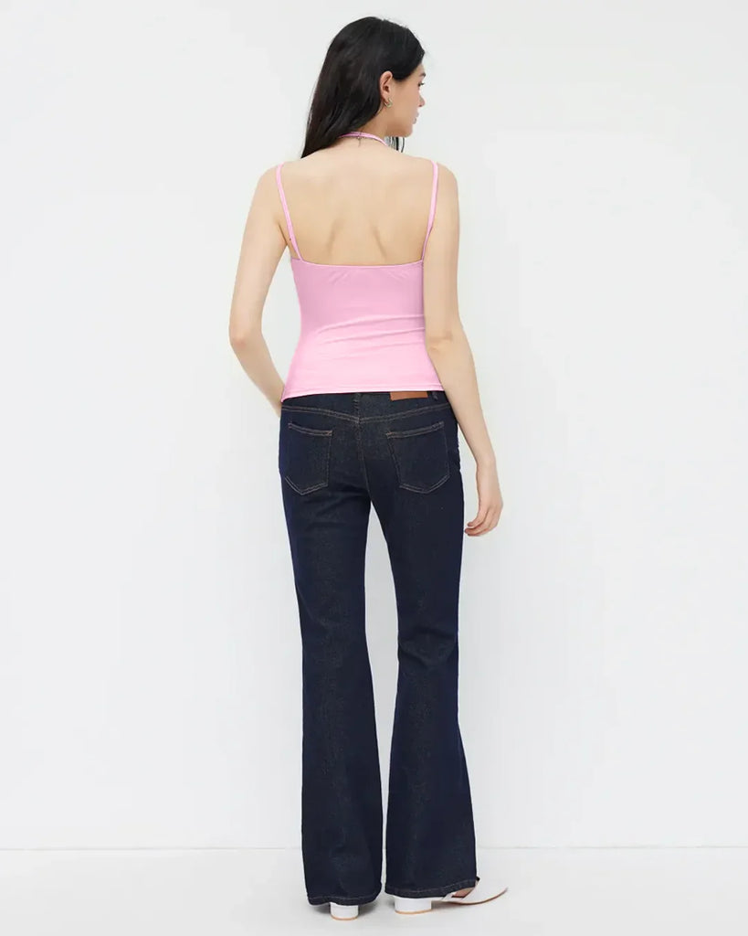 Back view of a Minimalist square neck cami top in prism pink with straps, showcasing a sleek and modern design.