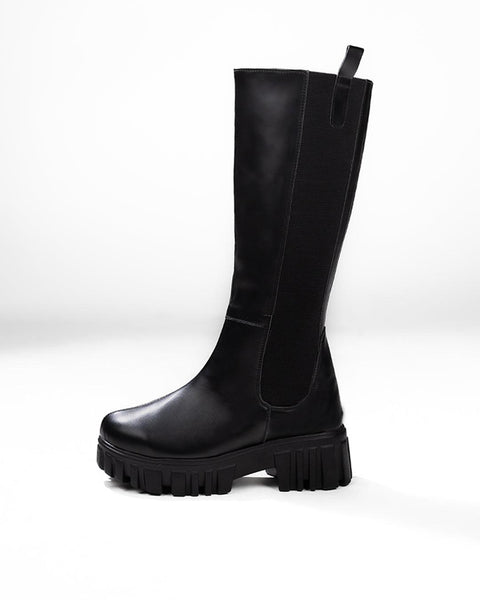 Black motorcycle knee boot with a platform sole and side zipper detail.