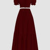 Front view of Burgundy off-shoulder puff sleeve slim fit top with A-line solid skirt, coordinated two-piece set