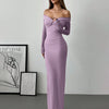 Model wearing a lilac off-shoulder mesh ruched fitted dress with long sleeves, showcasing a stylish and elegant look.
