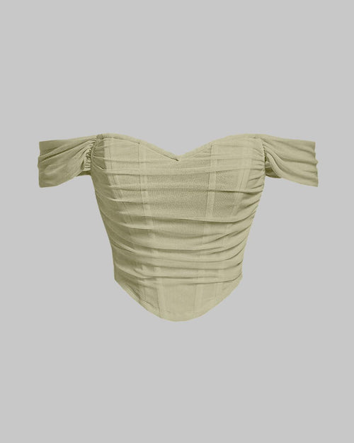 Off-shoulder green mesh top featuring a stylish ruched neckline