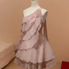 Front view of purple ruffle dress with one-shoulder layered asymmetrical design and flared hem silhouette