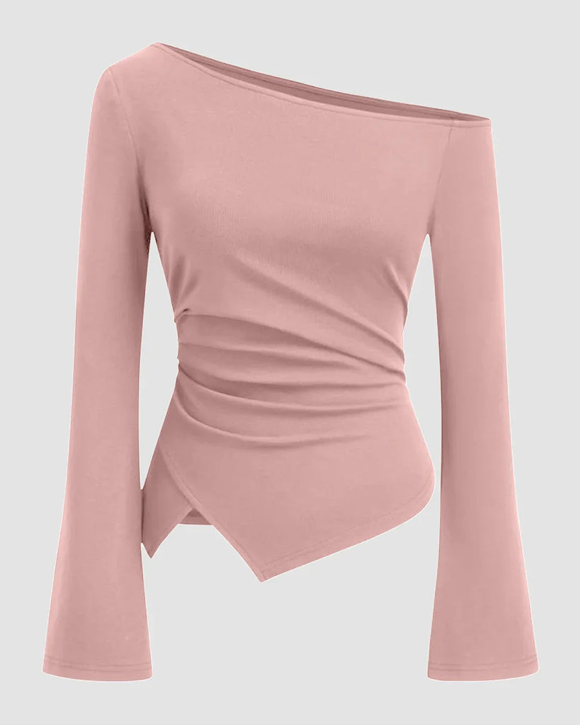 Pink asymmetrical shoulder top with ruched design and full sleeve, styled in a rose color.