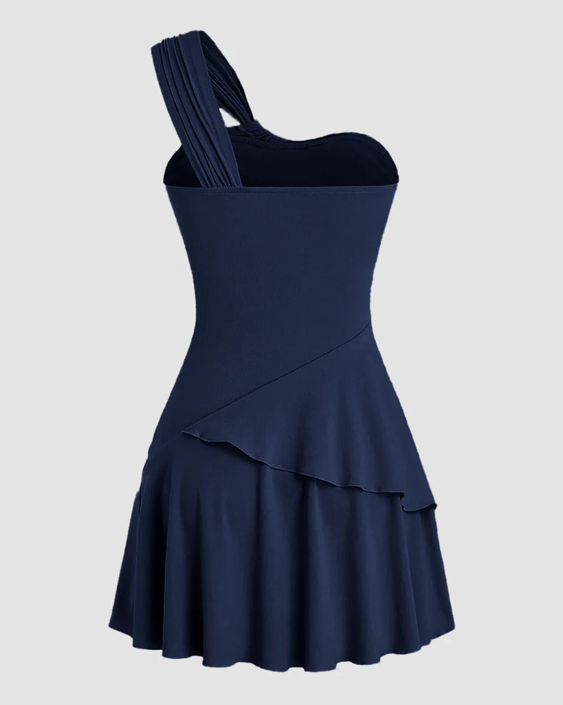 Back view of a Navy blue one-shoulder mini dress with ruched bodice and layered hem, perfect for a night out or special occasions.