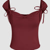 Front view of Maroon tie strap top with sweetheart neckline, adjustable shoulder bows and smooth stretch fabric for a flattering fit