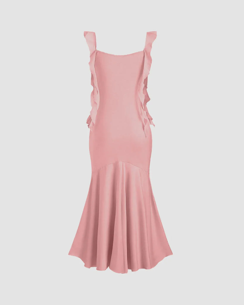 Pink midi dress featuring ruffled shoulder straps and a fishtail hem, elegantly designed for a stylish look.
