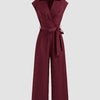 Burgundy cotton jumpsuit featuring a plain collar, pockets, and a belt, designed for comfort and style.