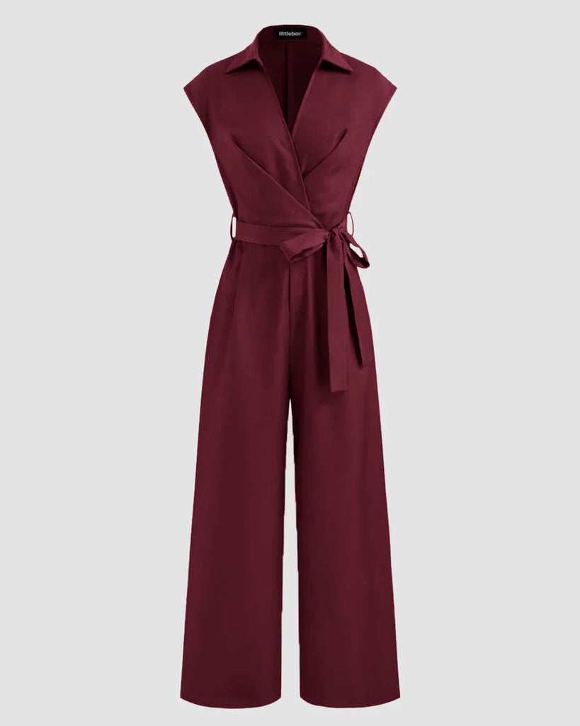 Burgundy cotton jumpsuit featuring a plain collar, pockets, and a belt, designed for comfort and style.
