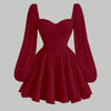 red dress featuring a pleated bust, lantern sleeves, and a flared skirt 