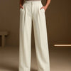 Pleated High Waisted Wide Leg Trousers in Off-White On Model For Women | Littlebox India