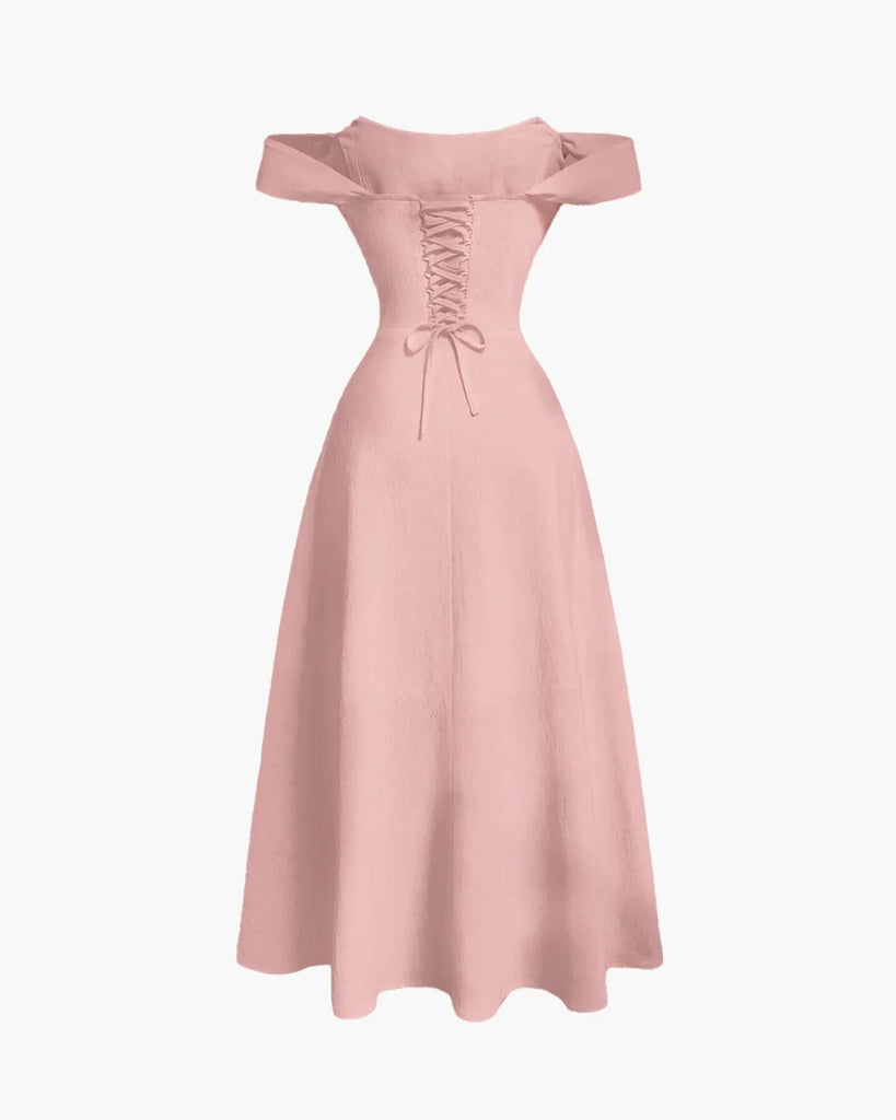 Powder pink off-shoulder dress featuring a faux fishbone design for structured elegance and a romantic, sculpted silhouette.