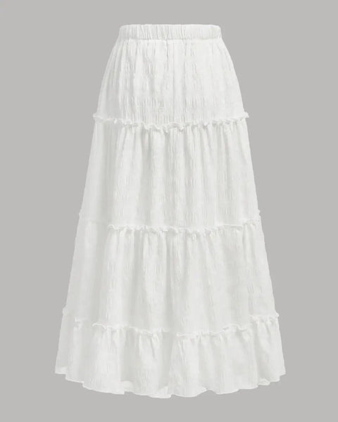 Front view of White pleated midi skirt with tiered ruffle layers, elastic waist, and flowy silhouette for summer wear.