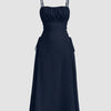 Navy blue cami dress with ruched bust, lace-up sides and spaghetti straps