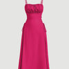 A vibrant hot pink cami dress featuring a ruched bust, delicate spaghetti straps, and lace-up side detailing for a playful yet refined silhouette.