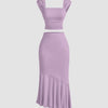 Soft, lightweight lilac dress featuring a ruched crop top and an asymmetric hem skirt set.