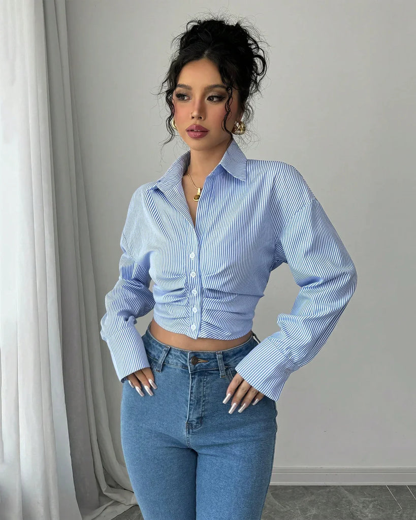 Women wearing a collared crop stylish shirt with a ruched front, perfect for blending business and streetwear vibes.