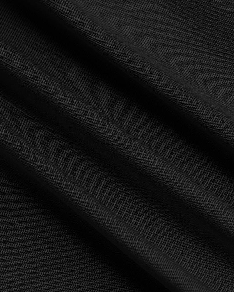 black crop cami top featuring ruffled sleeves and a ruched lettuce trim design close view