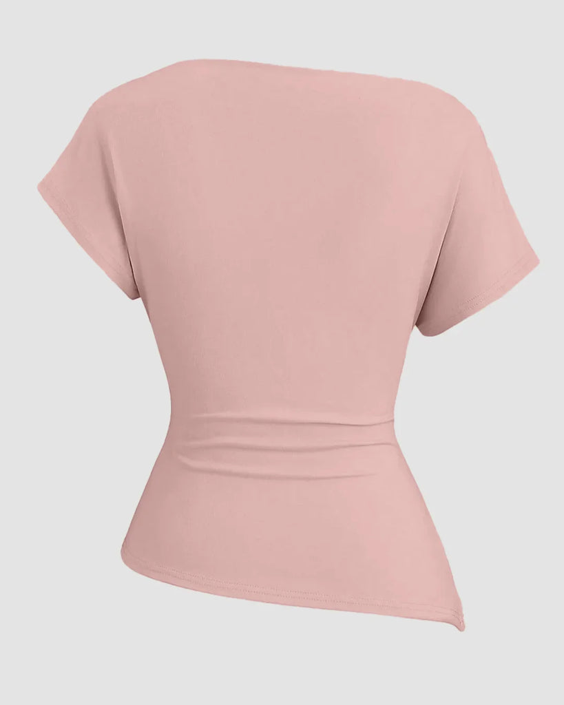 Back view of a Pink ruched top with an asymmetric neckline, featuring one shoulder design in a rose color.