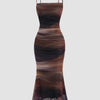 Ruched sheer mesh mermaid hem dress featuring a stylish brown and black print.
