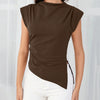 Model showcases a brown ruched side cap sleeve top featuring a stylish side slit.