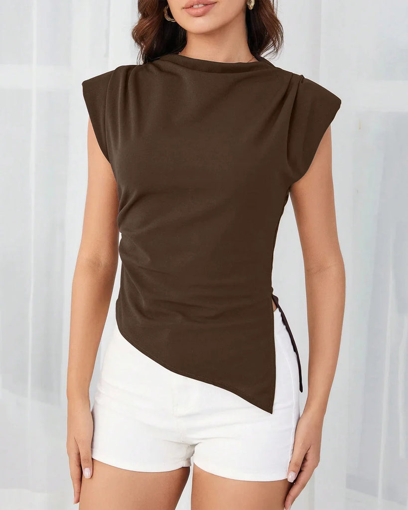 Model showcases a brown ruched side cap sleeve top featuring a stylish side slit.