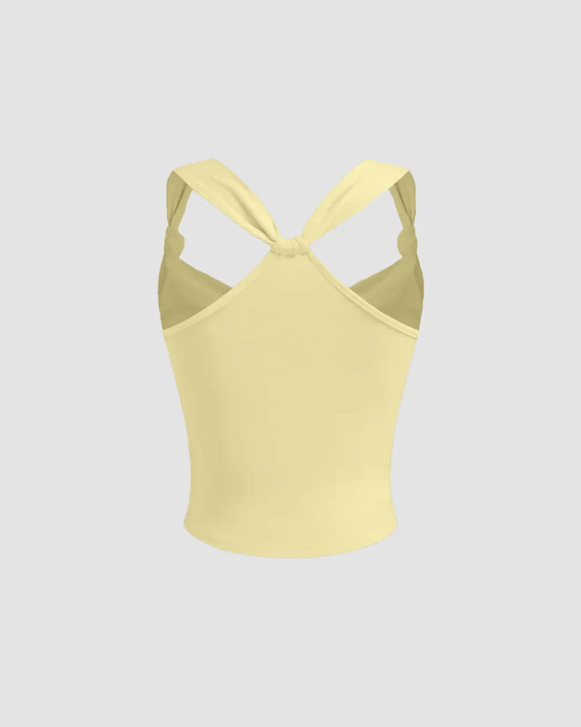 Back side Yellow ruched strap tank top with a sweetheart neckline, sleeveless design, in a soft vanilla color