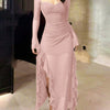A light pink maxi dress featuring a ruched sweetheart neckline and ruffle hem for a romantic, flowing silhouette.
