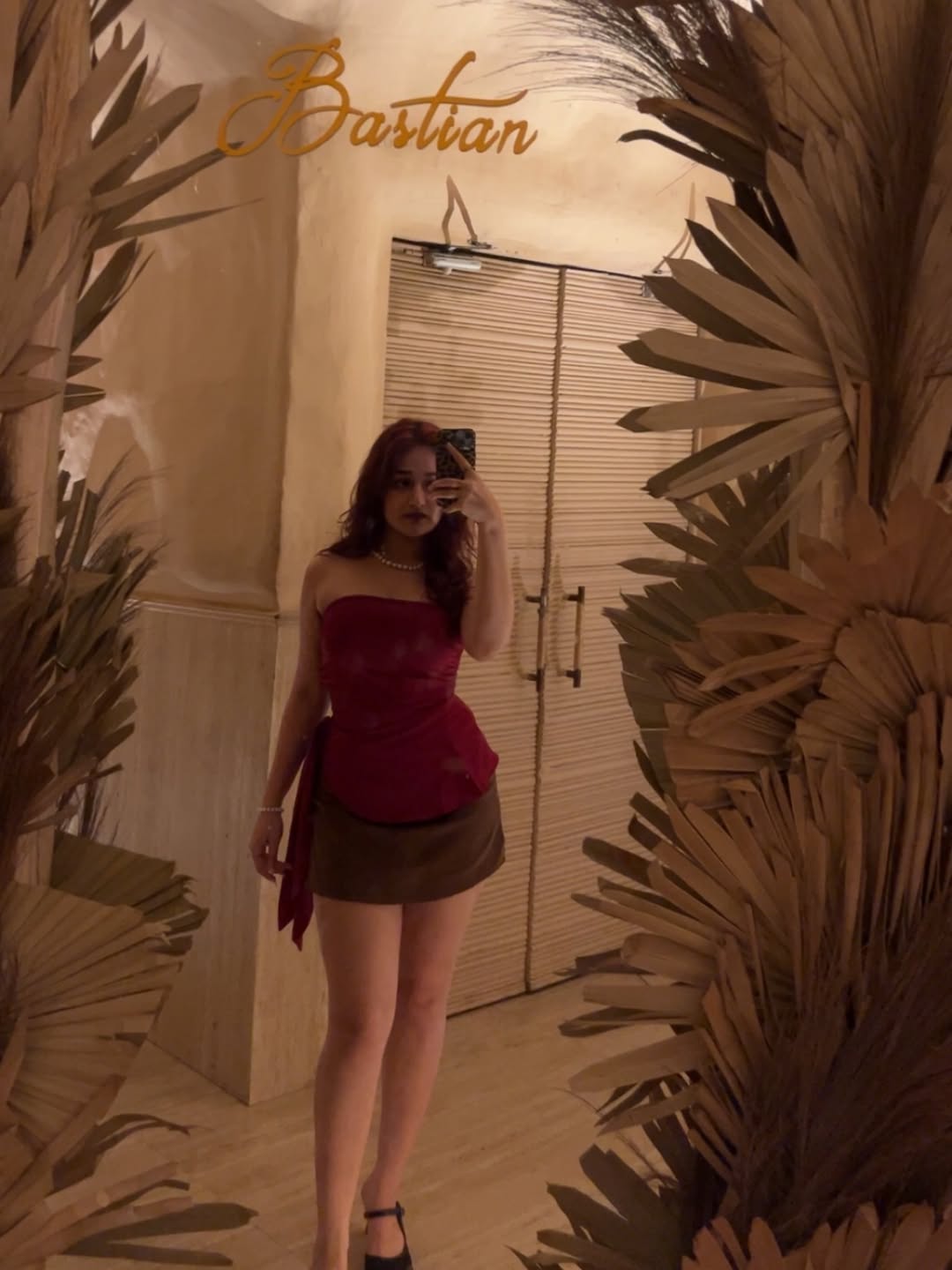 Customer photo 2 of High-Waist Draped Wrap Mini Skirt in Brown