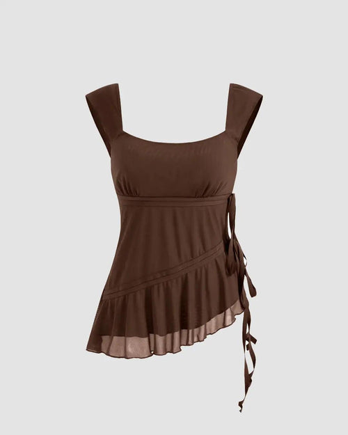 Front view of a brown scoop neck tank top with wide straps, side tie-up detail, and asymmetrical flared hem on a plain background.