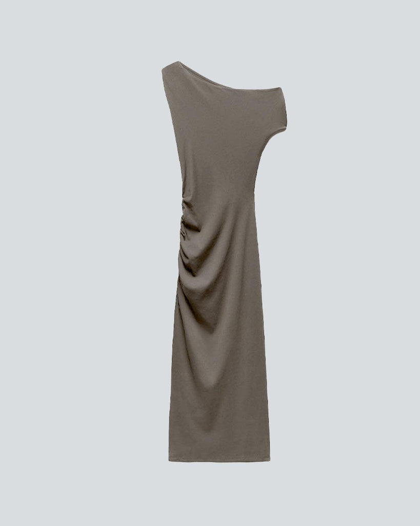 A grey dress featuring a slant neckline and draped shoulder detail for a sophisticated, asymmetrical look.