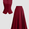 Front view of Sleeveless burgundy dress and skirt set featuring buttons, designed as a flared midi co-ord outfit.