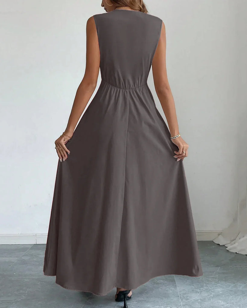 Plum kitten-hued sleeveless fit-and-flare maxi dress with an elegant silhouette.