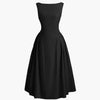 Sleeveless black flared midi dress with a flowy design, perfect for casual outings or special occasions.
