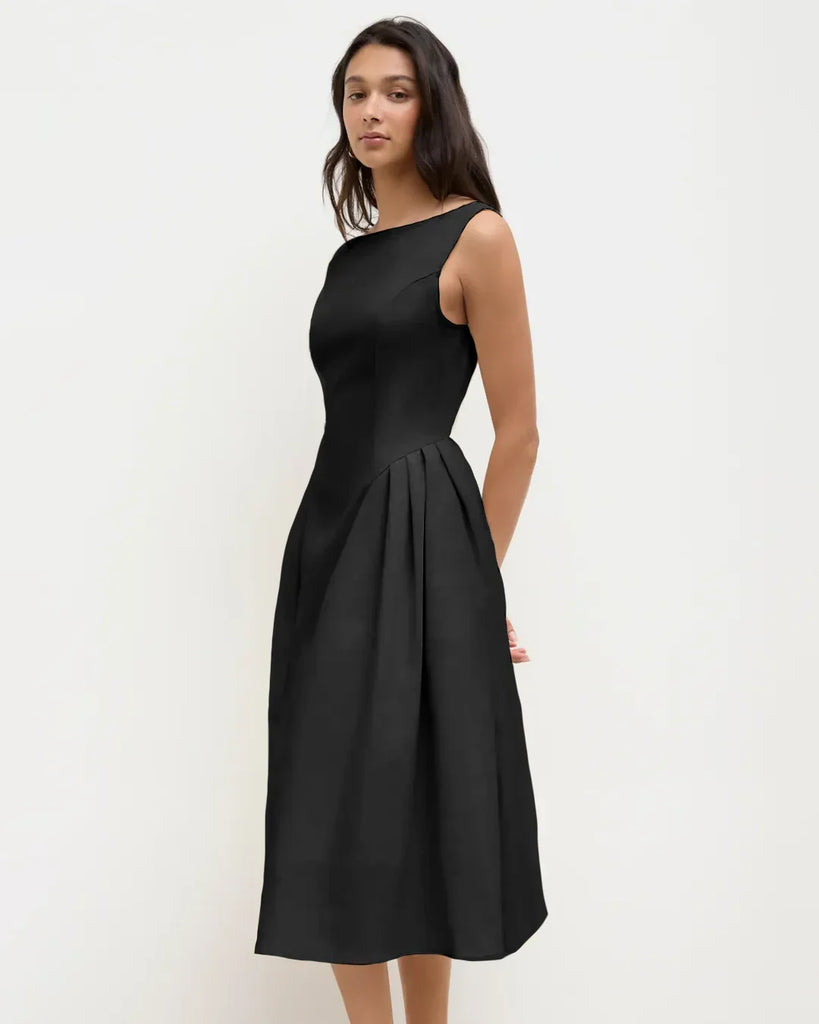 Sleeveless black flared midi dress with a flowy design, perfect for casual outings or special occasions.